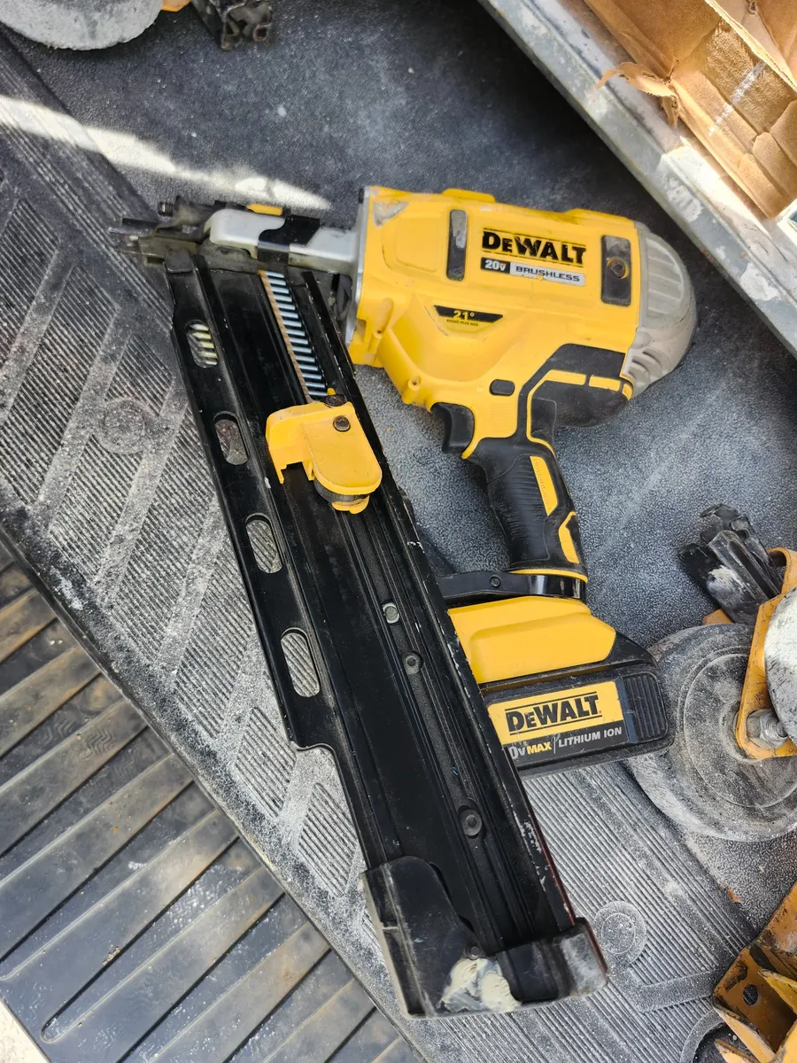 My field-used DEWALT 20V MAX 30-degree cordless framing nailer in my work van.