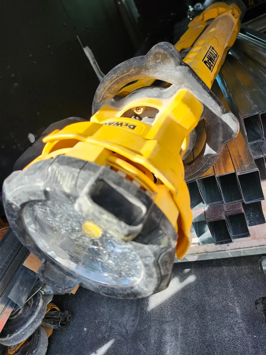 My field-used DEWALT DCL079B cordless tripod light stored in my work van.