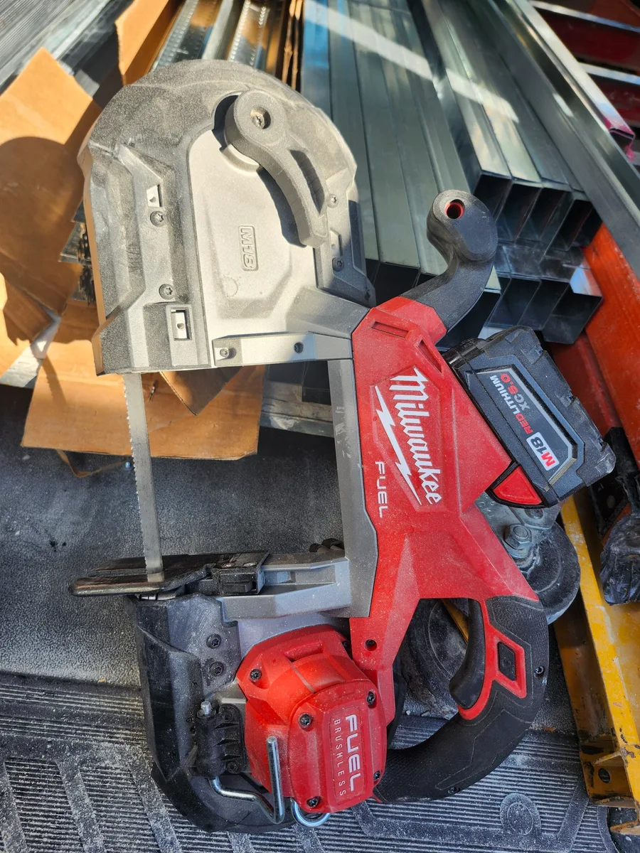 A Milwaukee M18 FUEL deep cut band saw in a work van.
